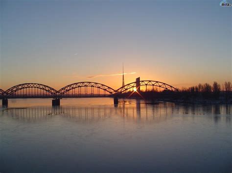 Railway bridge over the Daugava river in Riga | Background, Arch bridge ...