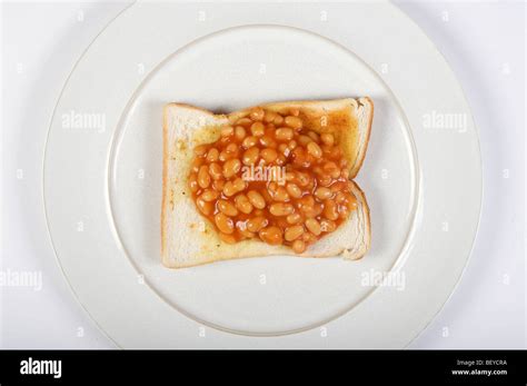 Beans on toast, a traditional British snack Stock Photo - Alamy