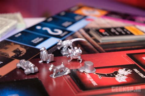 Monopoly Cheaters Edition comes with handcuffs - GEEKSPIN