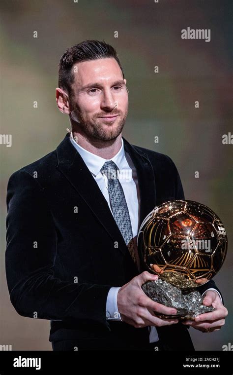 Paris, France. 2nd Dec, 2019. Barcelona's Argentinian forward Lionel Messi poses with the trophy ...