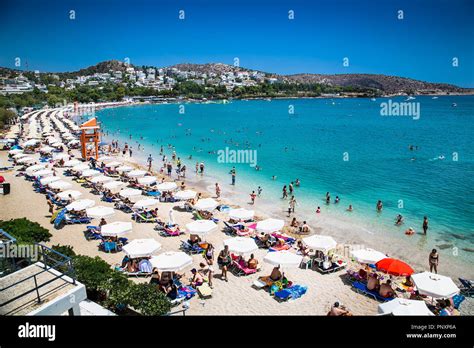 ATHENS, GREECE - JUNE 19, 2016: People on the Voullagmeni beach in Voula, Athens, Greece Stock ...