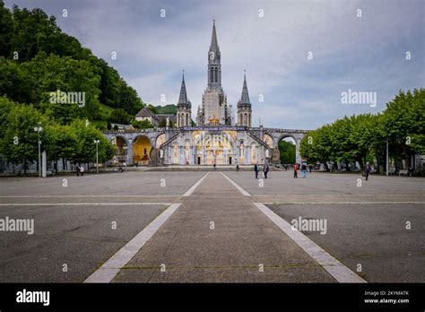 View on the 19th century Notre Dame Basilica of Lourdes in the French ...