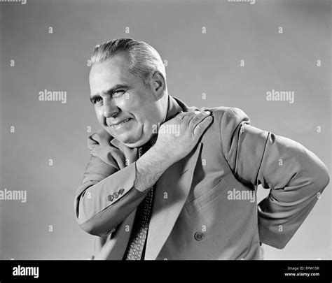 Old man back pain Black and White Stock Photos & Images - Alamy