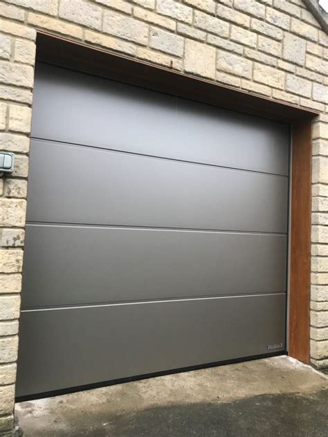 Sectional Garage Door in Grey Aluminum - Dorset Garage Doors