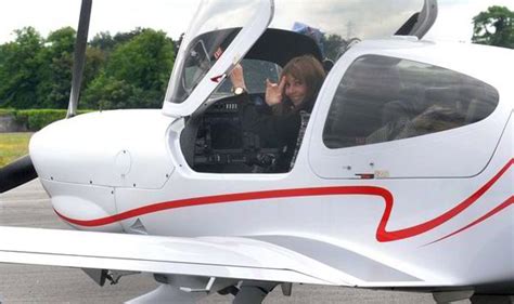 Carol Vorderman wears skin-tight black outfit to pilot her own plane ...