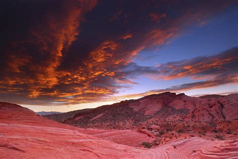 Fiery sunrise from Fire Mesa at Valley of Fire State Park in Nevada Photograph by Jetson Nguyen ...