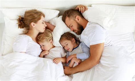 Healthy Sleep. Happy Family Parents and Children Sleeping in White Bed Stock Image - Image of ...