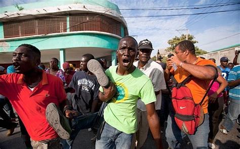 Violent protests in Haiti lead to PM resignation