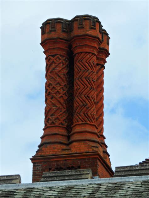 Decorative Tudor brick chimneys at the Hampton Court Palace | Chimney design, Picture design ...