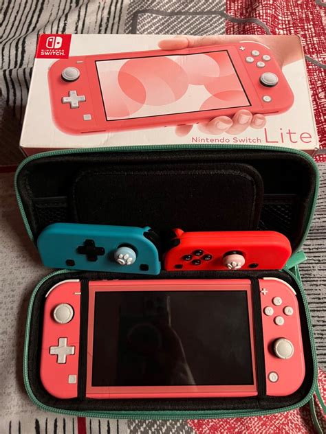 Nintendo switch lite pink, Video Gaming, Video Game Consoles, Nintendo ...