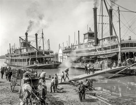 Memphis circa 1906. "A Mississippi River landing." The sidewheeler Belle of the Bends taking on ...