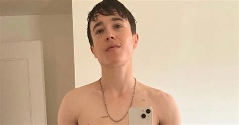 Elliot Page proudly shows off abs and chest as he jokes: 'My new phone works' - VT