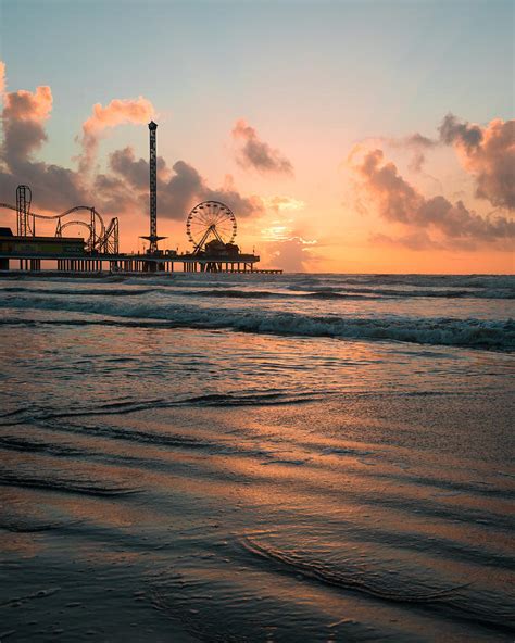 Galveston Pier Sunrise Photograph by Ray Devlin