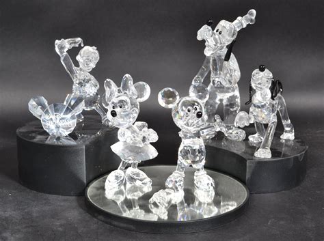 Swarovski Crystal Walt Disney Showcase Collection figurines to include Mickey and Minnie Mouse Go