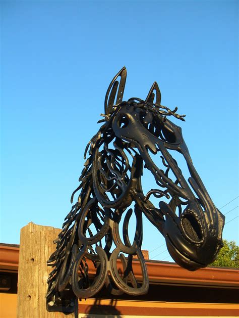 Horse Head made from recycled horseshoes | Metal yard art, Scrap metal art, Metal horse sculptures