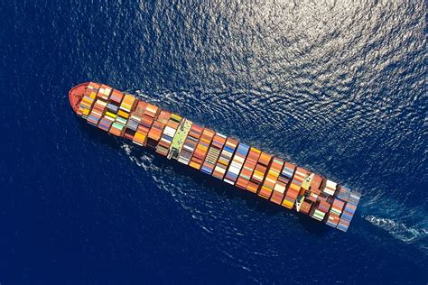 Vibrant Container Ship Aerial View - HD Wallpaper