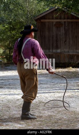 Cowboy cracking a stockwhip Whip cracking demonstration at Silver River ...