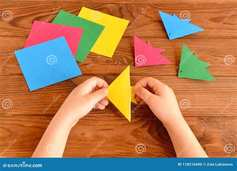 Origami Colorful Fish, Paper Sheets, Scissors. Child Holds Paper Sheet in His Hands and Making ...