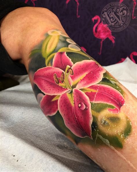 Stargazer lily tattoo by Liz Venom from Bombshell Tattoo Galerie in Edmonton, Canada : r/tattoos