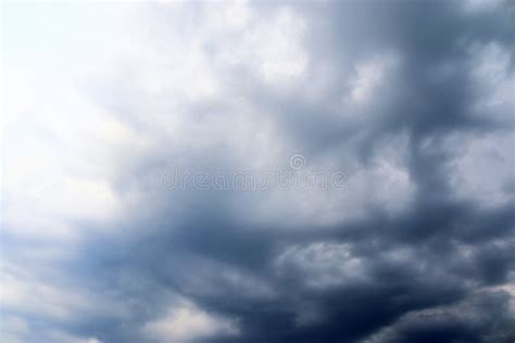 Dark Cloud Formations Forming before a Storm on a Blue Sky Stock Photo - Image of dark ...