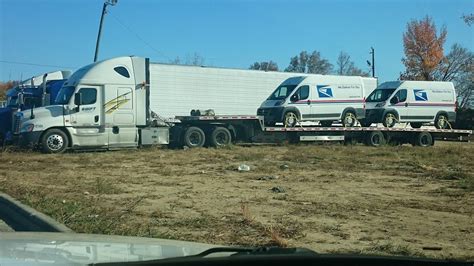 This truck is delivering mail trucks. : mildlyinteresting