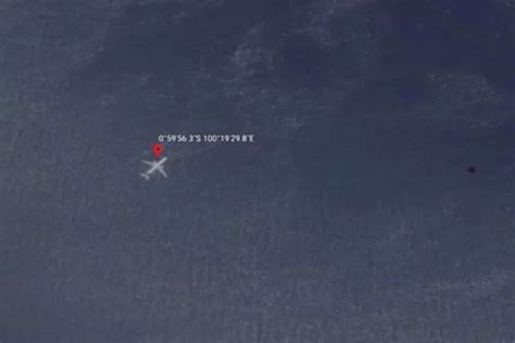 Flight MH370 conspiracy theorist spots 'underwater' plane on Google ...