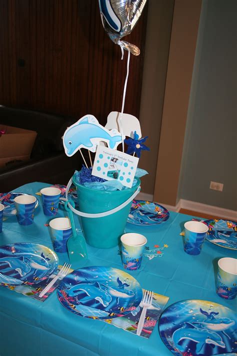 Dolphin Tale birthday party, bucket for treat, pinwheel | Dolphin birthday parties, Dolphin ...