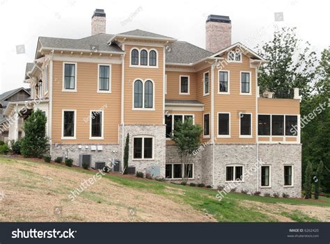 Upper Middleclass Home On Landscaped Lot Stock Photo 6262420 - Shutterstock