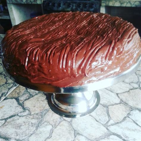 torta tronchatoro rellena de ganache de chocolate venezolano el.mejor del.mundo!! | Cake, Cake stand