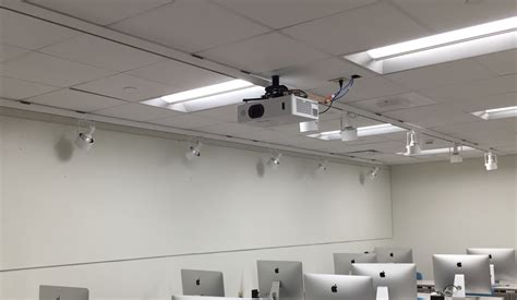 Here's a Hitachi Projector mounted in a computer lab classroom | Projector setup, Projector ...