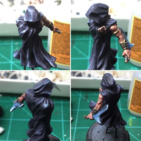 Working on a shadow monk for a client's D&D campaign. First go at NMM gold and with the blade ...