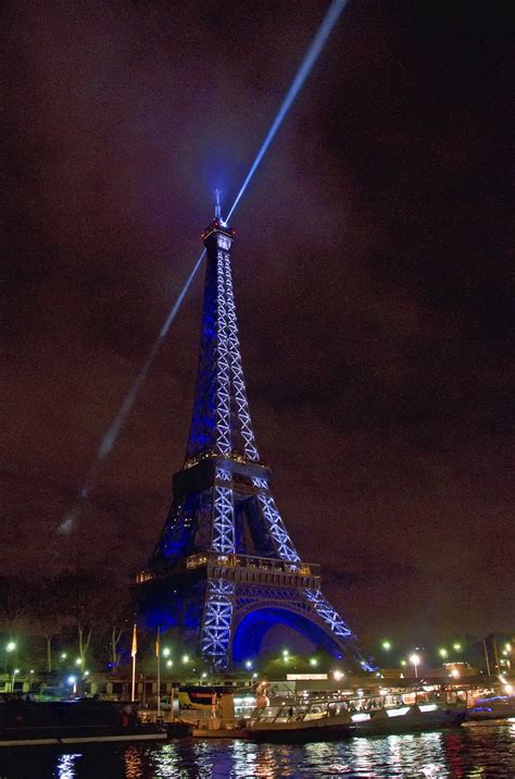 Eiffel Tower at Christmas taken from below on Seine River | Smithsonian ...