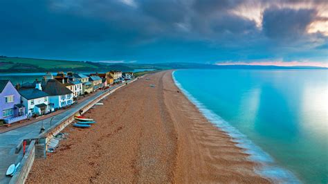 Beautiful Scenery Beach Sand Ocean Houses Under White Clouds Blue Sky ...