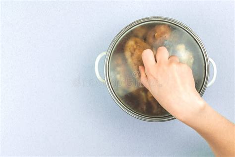 A Woman Cooked a Saucepan of Roasted Fried Chicken for Family Dinner, Flat Lay Background, Top ...