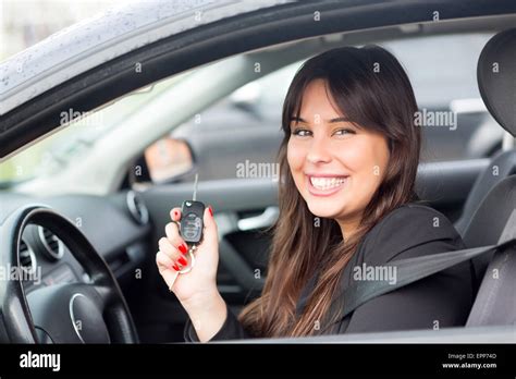 Business woman driving her new sports car Stock Photo - Alamy