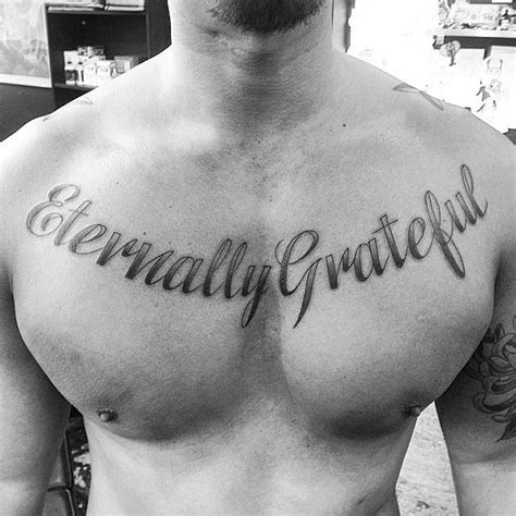 "Eternally Grateful" lettering tattoo located on the