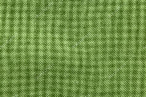 Textured background rough fabric of green olive color — Stock Photo © ivo_13 #180252726