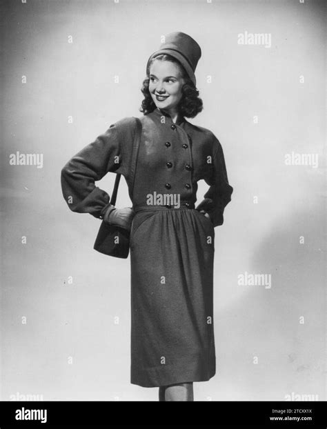Woman wearing green wool coat Black and White Stock Photos & Images - Alamy