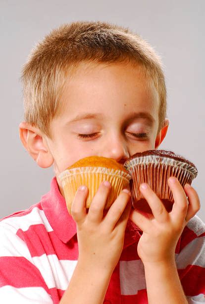 Best Child Smelling Food Stock Photos, Pictures & Royalty-Free Images ...