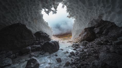 Download wallpaper 3840x2160 cave, stones, ice, frozen, water, nature 4k uhd 16:9 hd background