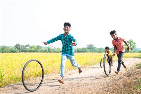 130+ Children Playing With A Tire India Stock Photos, Pictures ...