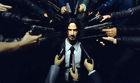 John Wick Surrounded By Guns 1 In The Opening Sequence Of John Wick ...