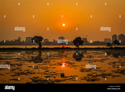 Sunset on West lake, Ho tay, Hanoi, Vietnam Stock Photo - Alamy