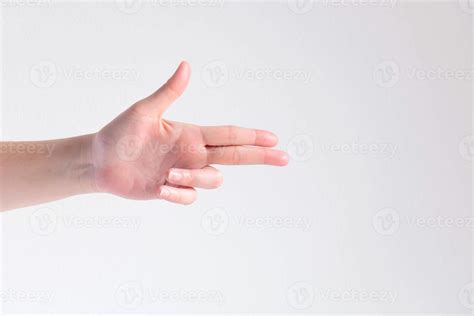 A hand pose to be gun shape on white background. 11669442 Stock Photo ...