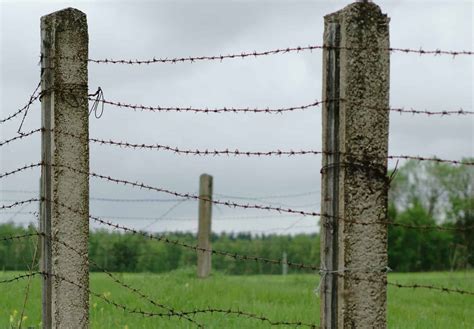 How To Attach Barbed Wire To Posts - Legend Fence Corp.