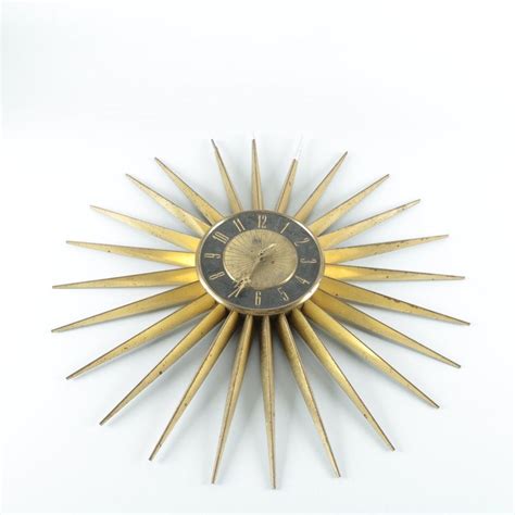 Elgin Mid Century Modern Sunburst Wall Clock | Wall clock, Clock, Modern clock