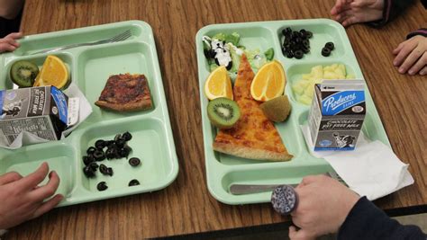 School lunch lady feeds hungry kid, gets fired