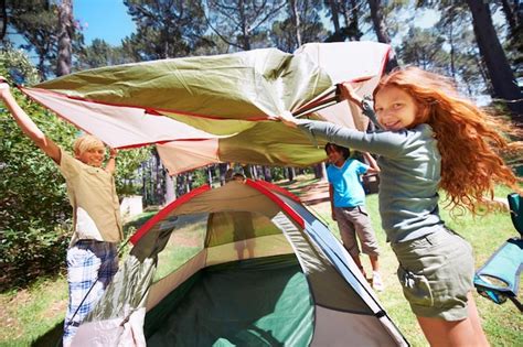 Premium Photo | Happy children portrait and tent setup in camping forest for shelter cover or ...