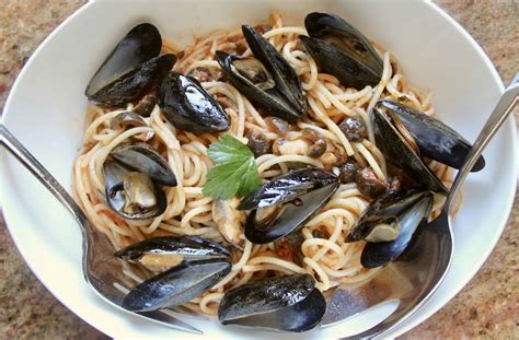 Mussel Pasta (Italian recipe with Olives and Tomatoes) - Christina's Cucina