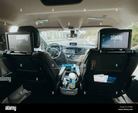 The interior of a fully autonomous Waymo driverless ride-hailing car on ...